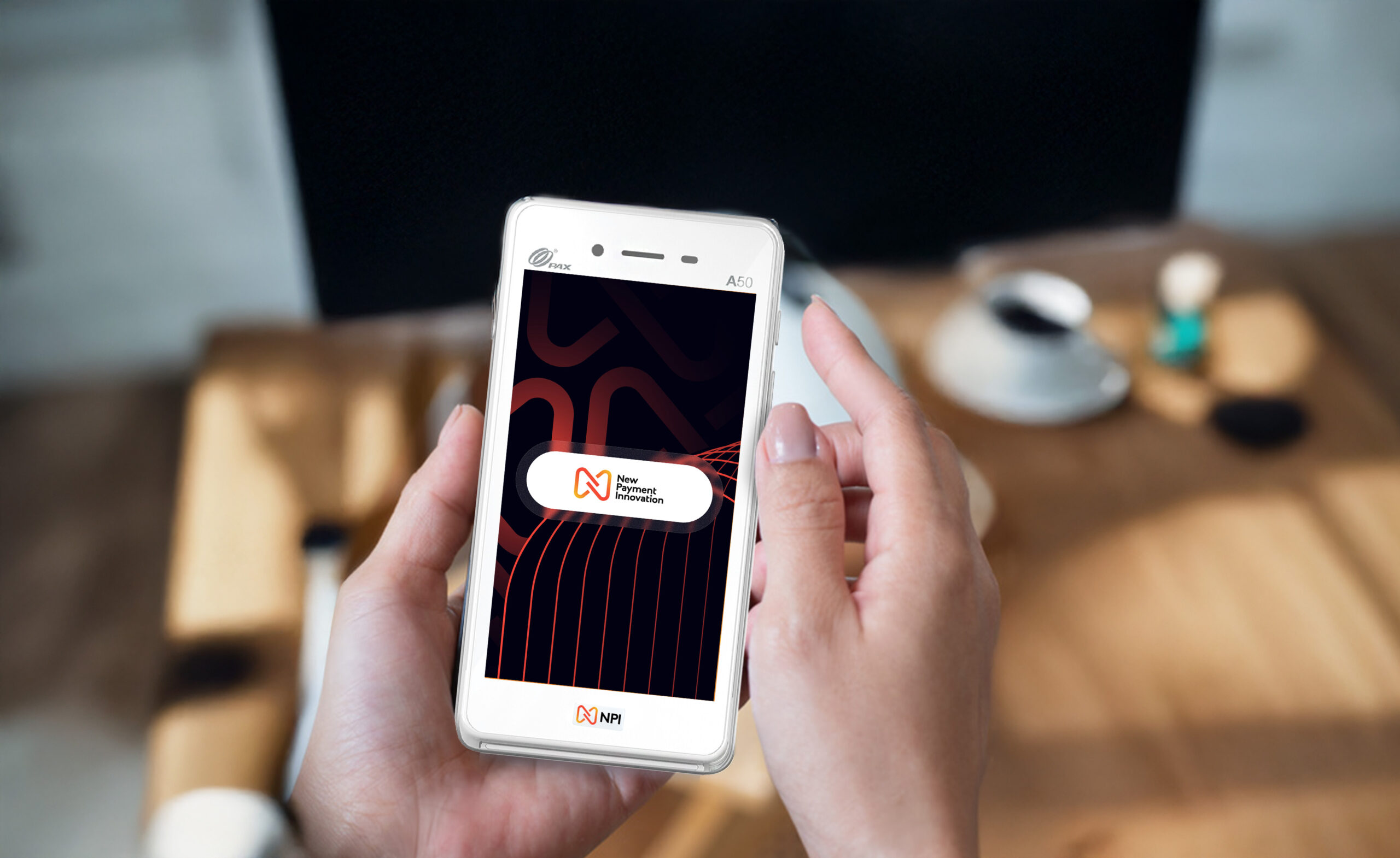 Card payment trends UK 2025 PAX A50 payment terminal in coffee shop environment