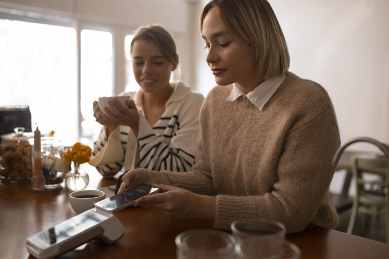 Customer making secure contactless payment on PAX A920 PRO card machine with GDPR compliant payment processing UK