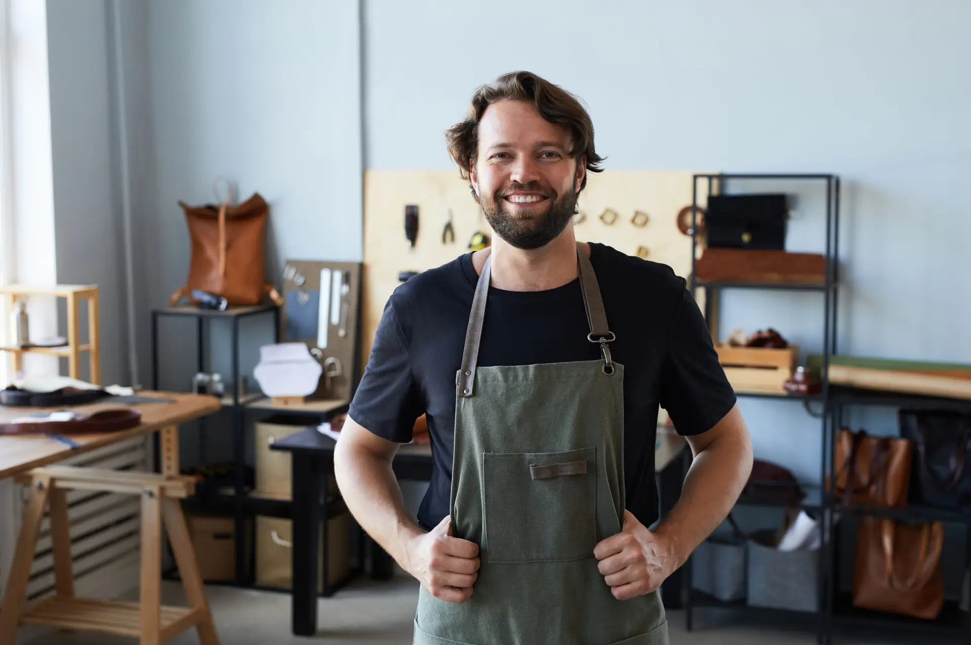 Small business owner ready to accept card payments UK with NPI payment solutions